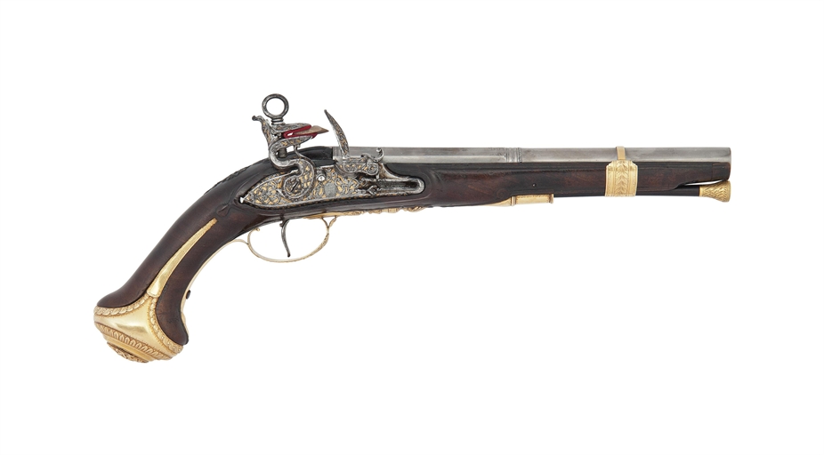 AN EXTREMELY RARE SPANISH GOLD-MOUNTED MADRID-LOCK PISTOL
BY GREGORIO LOPEZ, DATED '1803' 
With