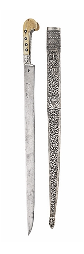 A CAUCASIAN SILVER-MOUNTED YATAGHAN 
19TH CENTURY 
With single-edged blade struck on one side with a