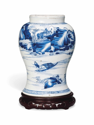 A CHINESE BLUE AND WHITE BALUSTER VASE 
KANGXI PERIOD (1662-1722) 
Painted to the body with a