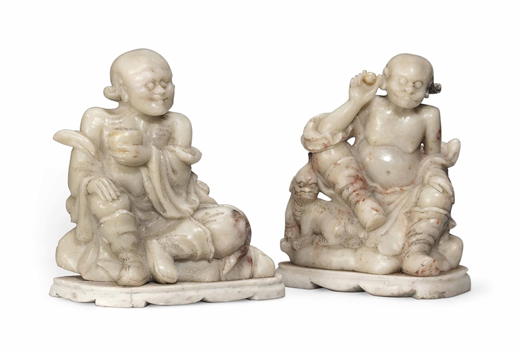 TWO CHINESE SOAPSTONE FIGURES 
17TH CENTURY 
One modelled as an emaciated luohan, an alms bowl in