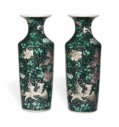 A PAIR OF CHINESE FAMILLE NOIR VASES 
19TH CENTURY 
With flared rims and tapering body, decorated to
