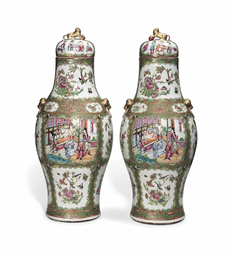 A PAIR OF CANTONESE FAMILLE ROSE VASES AND COVERS 
19TH CENTURY 
Each with two moulded fixed-ring