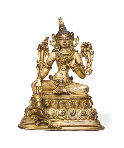 A NEPALESE GILT BRONZE BODHISATTVA 
20TH CENTURY 
The bejewelled figure seated in lalitasana on a