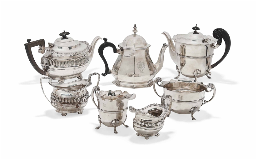 A THREE-PIECE SILVER TEA SET 
MARK OF GEORGE NATHAN & RIDLEY HAYES, CHESTER, 1912 
Of rounded oblong