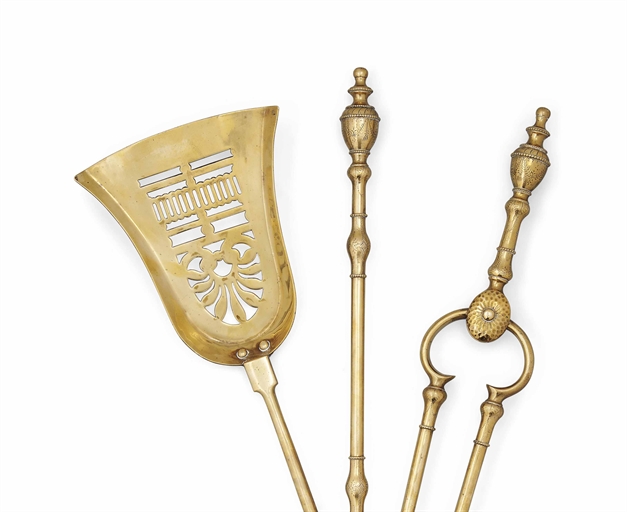 A SET OF ENGLISH BRASS FIRE-TOOLS 
OF GEORGE III STYLE, LATE 19TH CENTURY 
With ball finials, the