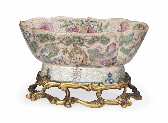A CHINESE CRACKLE-GLAZED FAMILLE ROSE LOBED BOWL WITH ORMOLU MOUNTS 
The porcelain, 19TH CENTURY 
Of