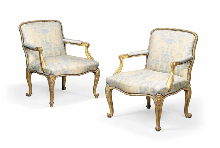 A PAIR OF GEORGE III GILTWOOD OPEN ARMCHAIRS 
IN THE MANNER OF JOHN LINNELL, CIRCA 1770 
Re-