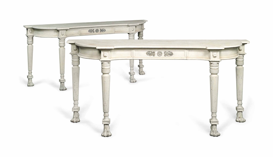 A PAIR OF GILT-METAL MOUNTED CREAM PAINTED CONSOLE TABLES 
OF REGENCY STYLE, RECENT MANUFACTURE