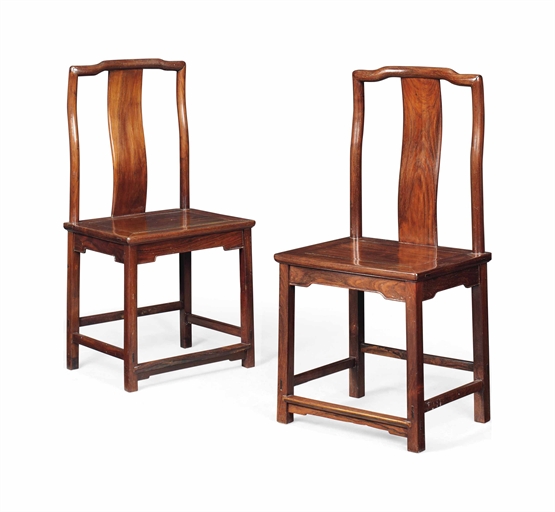 A PAIR OF CHINESE HUALI SIDE CHAIRS 
19TH CENTURY 
42 in. (108 cm.) high; 20¾ in. (53 cm.) wide; 16¾