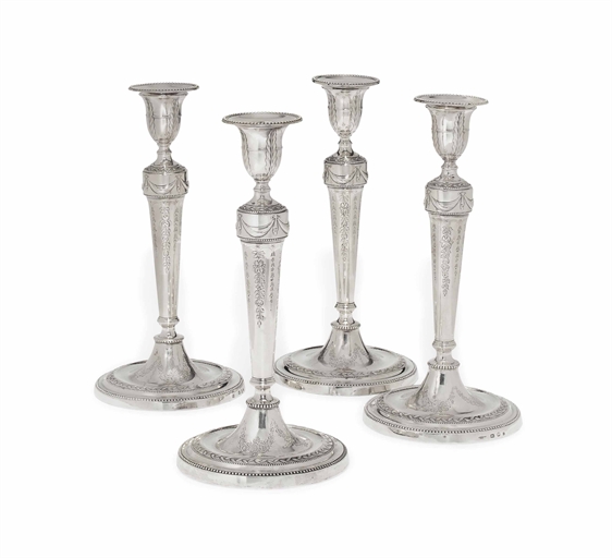 A SET OF FOUR GEORGE III SILVER CANDLESTICKS 
MARK OF DANIEL SMITH AND ROBERT SHARP (OF LONDON)