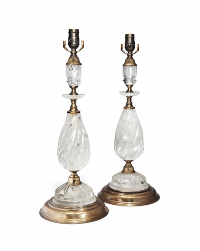 A PAIR OF ROCK CRYSTAL AND BRASS TABLE LAMPS 
THIRD QUARTER 20TH CENTURY 
Each with a domed base