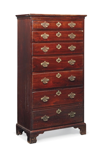 AN IRISH EARLY GEORGE III MAHOGANY CHEST 
MID-18TH CENTURY 
Of seven graduated drawers 
62¼ in. (158