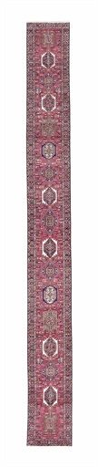 A VERY LONG KARAJA RUNNER, NORTH-WEST PERSIA 
CIRCA MID 20TH CENTURY 
APPROX; 25FT.9IN. X 2FT.8IN.(