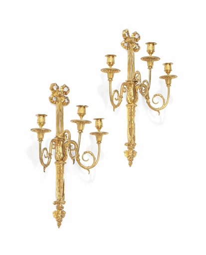 A PAIR OF ORMOLU THREE-LIGHT WALL APPLIQUES 
SECOND HALF 19TH CENTURY 
Each with ribbon-tied