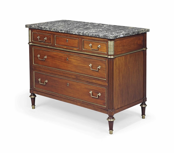 A DIRECTOIRE BRASS MOUNTED MAHOGANY COMMODE 
LATE 18TH CENTURY 
The gris St. Anne marble top with