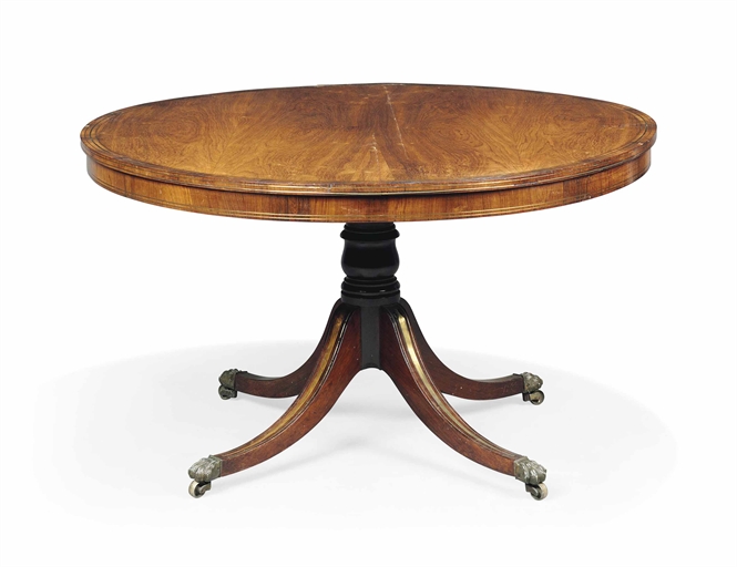 A REGENCY ROSEWOOD AND BRASS-INLAID CENTRE TABLE 
CIRCA 1810 
The rosewood-crossbanded tilt-top