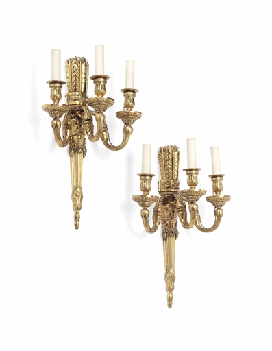 A PAIR OF NAPOLEON III GILT-BRONZE THREE-LIGHT WALL APPLIQUES 
SECOND HALF 19TH CENTURY 
The