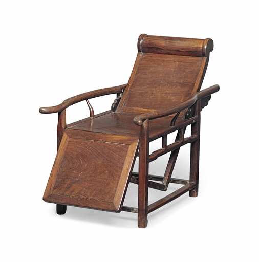 A CHINESE HARDWOOD 'STAR GAZING' RECLINING ARMCHAIR 
19TH CENTURY 
37½ in. (95.5 cm.) high; 20¾