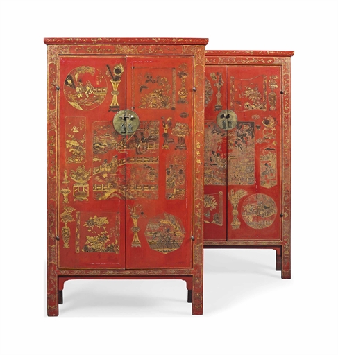 A PAIR OF CHINESE RED LACQUER AND GILT DECORATED CABINETS 
20TH CENTURY 
The doors decorated overall