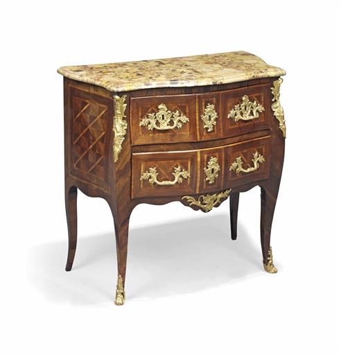 A LATE LOUIS XV GILT-METAL MOUNTED KINGWOOD CROSSBANDED SERPENTINE COMMODE
BY JEAN-CHARLES