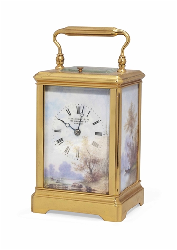 A FRENCH ORMOLU AND PORCELAIN-MOUNTED STRIKING CARRIAGE CLOCK 
RETAILED BY CARRINGTON & CO., LONDON,