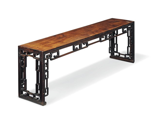 A CHINESE HARDWOOD LOW TABLE 
LATE 19TH EARLY 20TH CENTURY 
With a pierced geometric frieze 
18