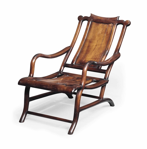 A CHINESE ROSEWOOD ARMCHAIR 
EARLY 20TH CENTURY 
With a fixed angled back 
View on Christies.com