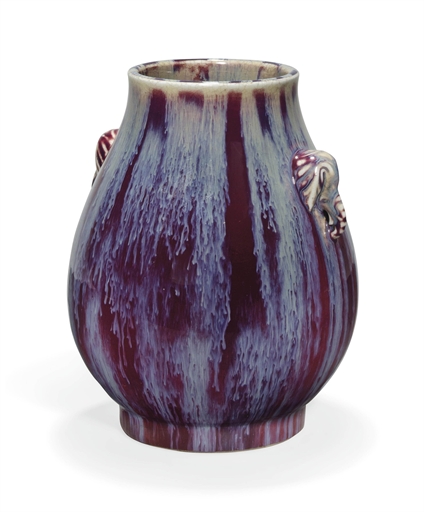A CHINESE FLAMBÉ PEAR-SHAPED VASE, HU, AND A FLAMBÉ BOTTLE VASE 
19TH/20TH CENTURY 
The first,