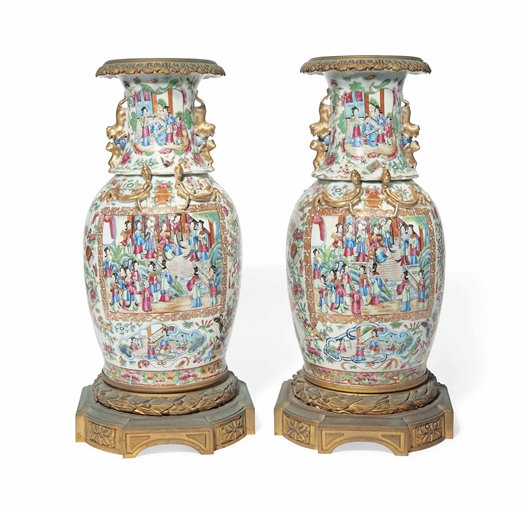 A PAIR OF ORMOLU-MOUNTED CANTONESE FAMILLE ROSE VASES 
19TH CENTURY 
Each of baluster form, with two