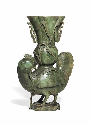 A CHINESE SPINACH GREEN JADE 'COCKEREL' VASE 
19TH CENTURY 
Modelled standing with its feathers