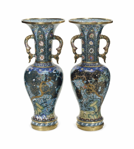 A PAIR OF CHINESE CLOISONNÉ ENAMEL BALUSTER VASES 
19TH/20TH CENTURY 
Each with dragon-shaped