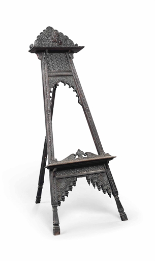 A SOUTH-EAST ASIAN CARVED HARDWOOD EASEL 
LATE 19TH  EARLY 20TH CENTURY 
Of tapering outline and