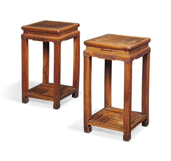 A PAIR OF CHINESE ELM URN STANDS 
20TH CENTURY 
Each with a scrolling foliate carved frieze, with