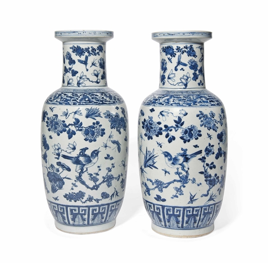 A PAIR OF CHINESE BLUE AND WHITE ROULEAU VASES 
19TH CENTURY 
Each decorated to the body with a