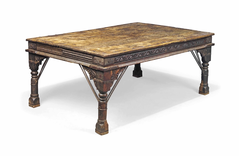 AN INDIAN HARDWOOD CENTRE TABLE 
PROBABLY LATE 19TH CENTURY EARLY 20TH CENTURY 
The planked top