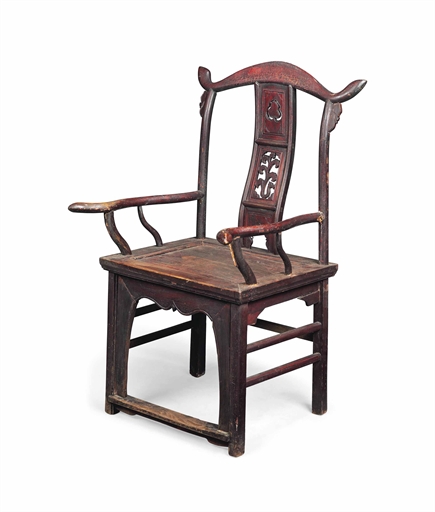 A CHINESE RED-PAINTED ELM CHAIR 
POSSIBLY 18TH CENTURY 
With a pierced splat and a panelled seat