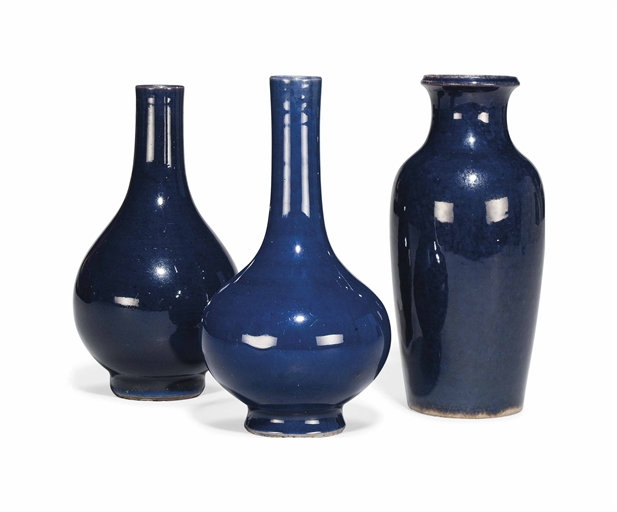 THREE CHINESE AUBERGINE-GLAZED VASES 
KANGXI PERIOD (1662-1722) 
The first, a bottle vase; the