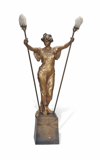 A GOLDSCHEIDER (EST.1885) ART NOUVEAU PAINTED EARTHENWARE FIGURAL FLOOR LAMP
CIRCA 1900 
Modelled