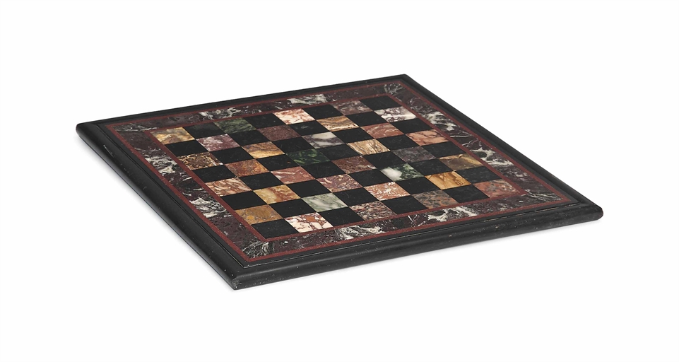 AN ITALIAN SPECIMEN MARBLE CHESS BOARD 
LATE 19TH/EARLY 20TH CENTURY 
13½ x 13½ in. (34.5 x 34.5