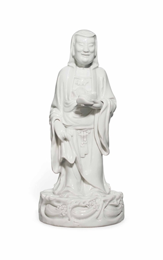 A CHINESE DEHUA MODEL OF BODHIDHARMA 
19TH CENTURY 
The bearded Indian monk modelled standing on a