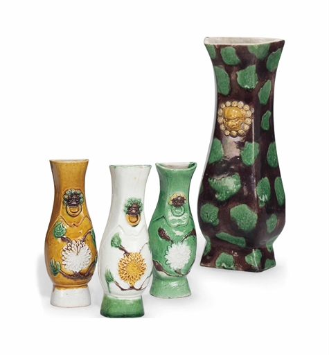 FOUR CHINESE BISCUIT-GLAZED WALL VASES 
KANGXI PERIOD (1662-1722) 
Comprising a wall vase