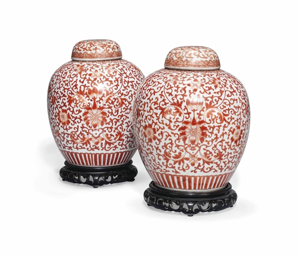 A PAIR OF CHINESE IRON-RED OVOID JARS AND COVERS 
19TH/20TH CENTURY 
Each with domed lid, the body