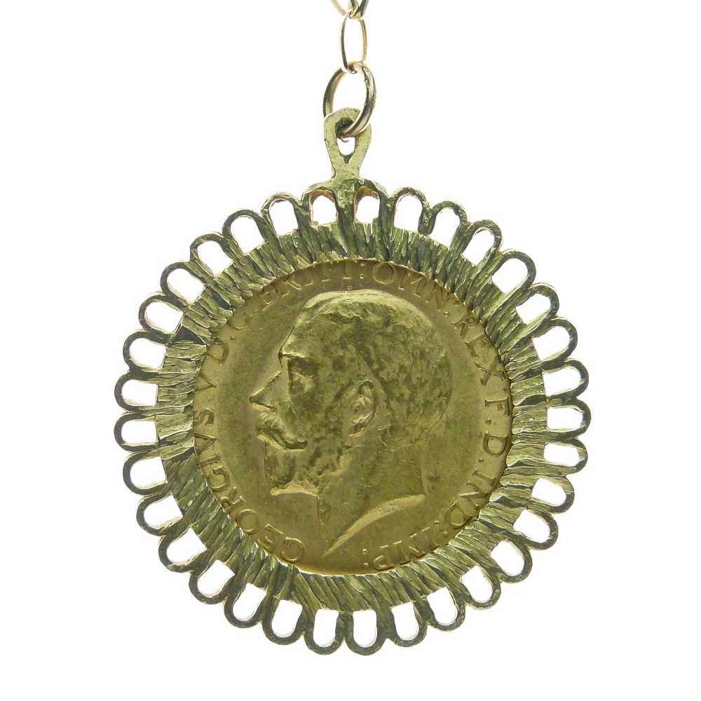 George V sovereign, 1912 mounted in a 9ct gold pendant mount, on a 9ct gold chain, 52cm long, 13.