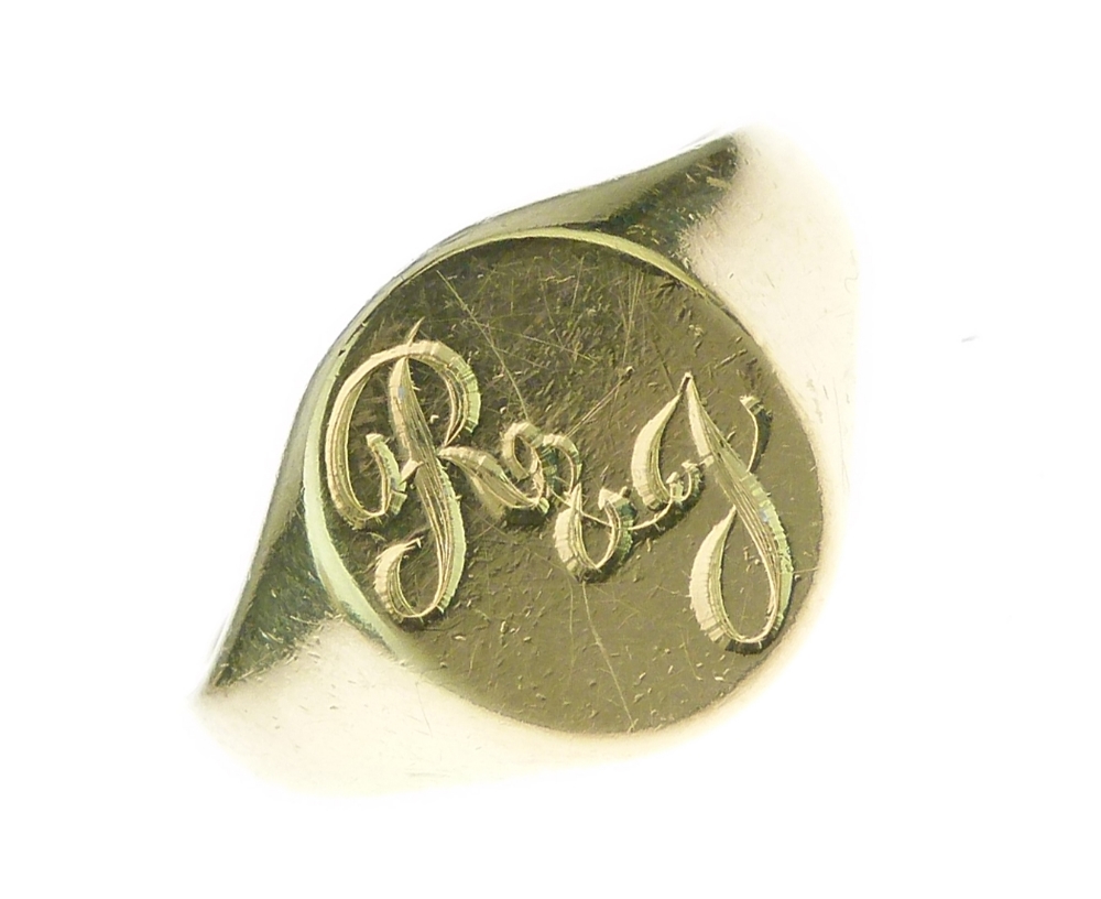 18ct gold signet ring, with monogrammed oval head, size T, 12g gross