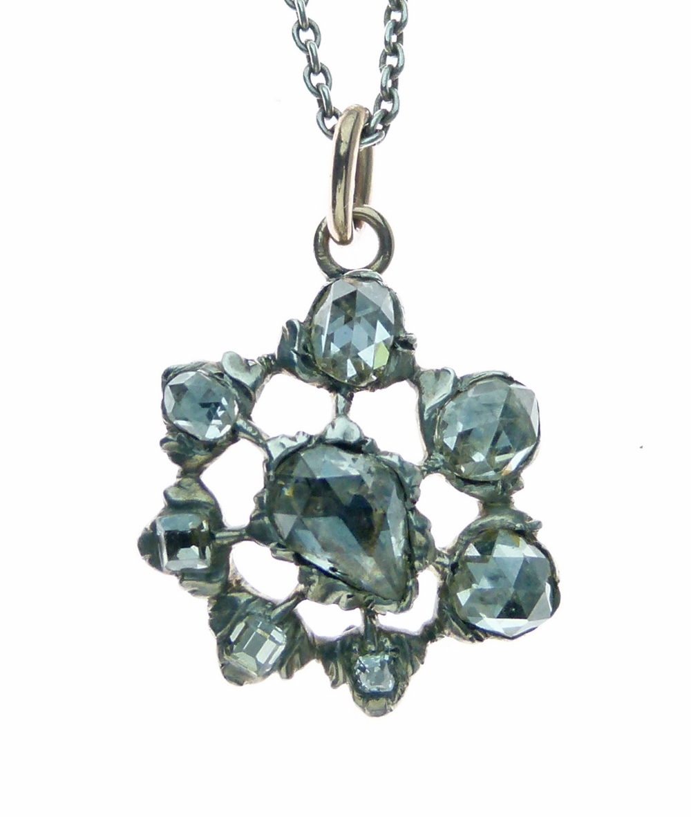 Rose diamond pendant, the eight stones to a cluster design, 1.7cm across, on a chain
