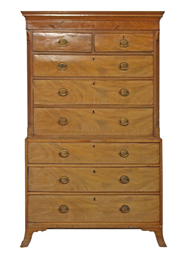 George III mahogany chest on chest having a moulded cornice, the upper section fitted two short