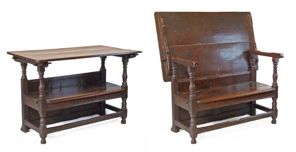 17th Century West Country oak table settle, of joined construction, having a plain up-and-over