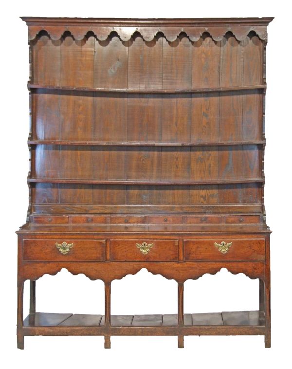 18th Century Welsh oak dresser, probably Carmarthen region, the socket fitting plate rack having a