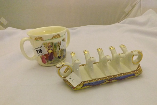 POTTERY TOAST RACK AND ROYAL DOUTON BUNNYKINS CHILD`S CHRISTENING MUG