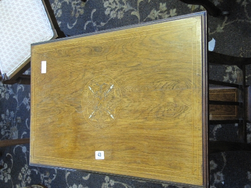 An inlaid mahogany Edwardian occasional table with under tier.